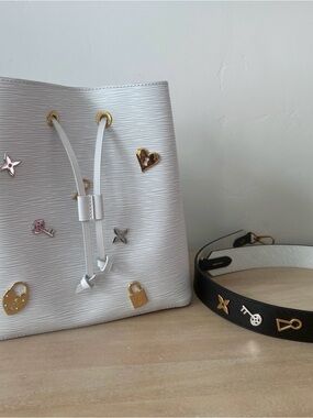 Louis Vuitton White Epi Drawstring Shoulder Bag with Mixed Metal Charms